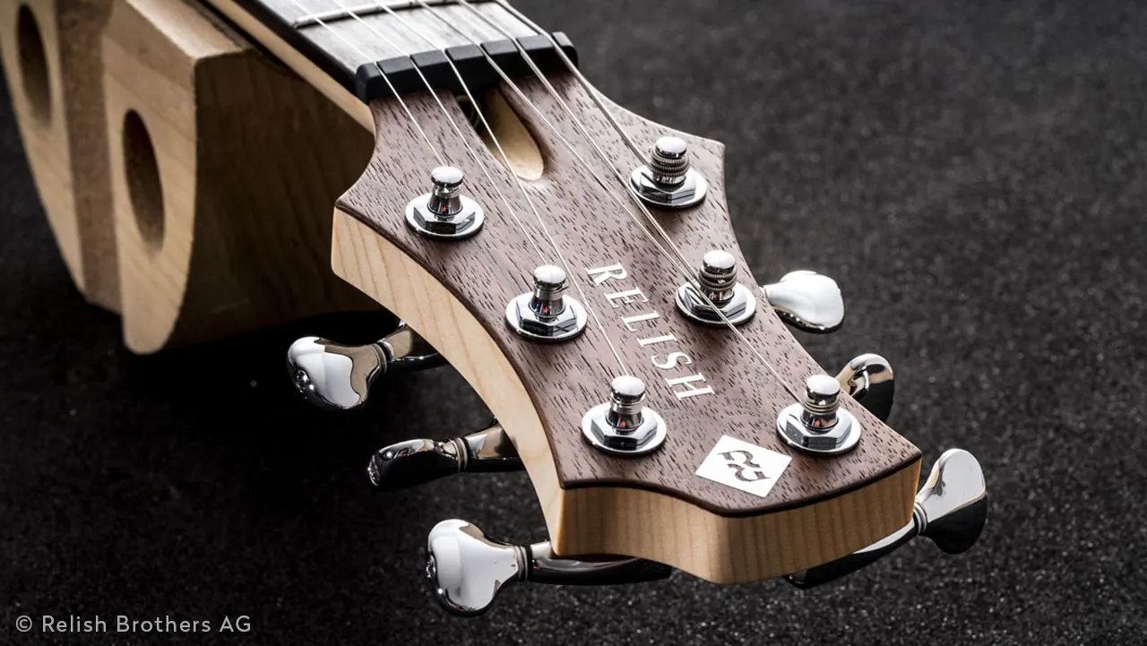 Headstock of the Relish electric guitar with tuners